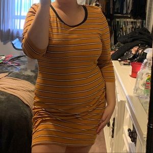 A yellow mid sleeve dress